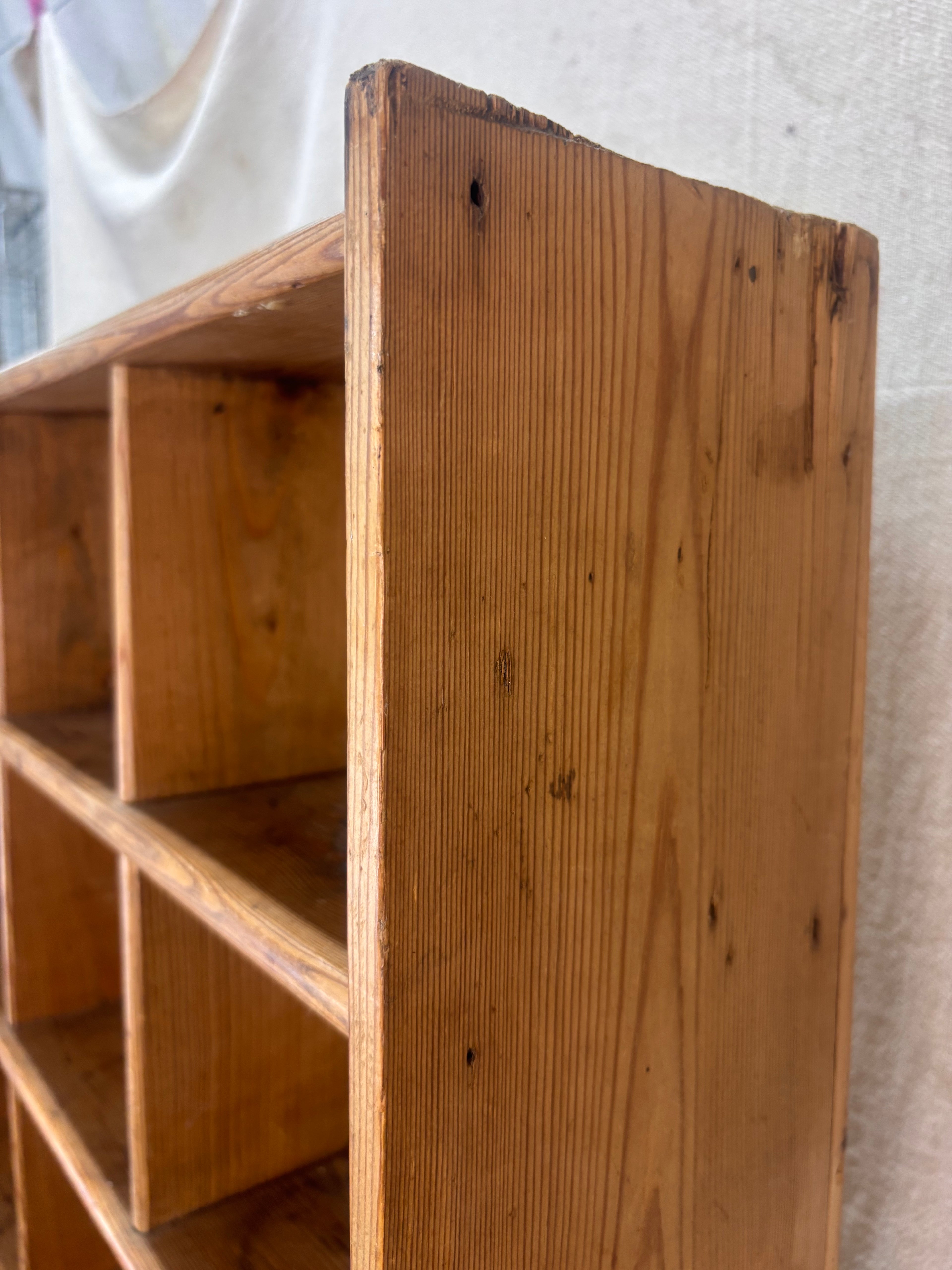 Close-up of a wooden shelf with a textured surface