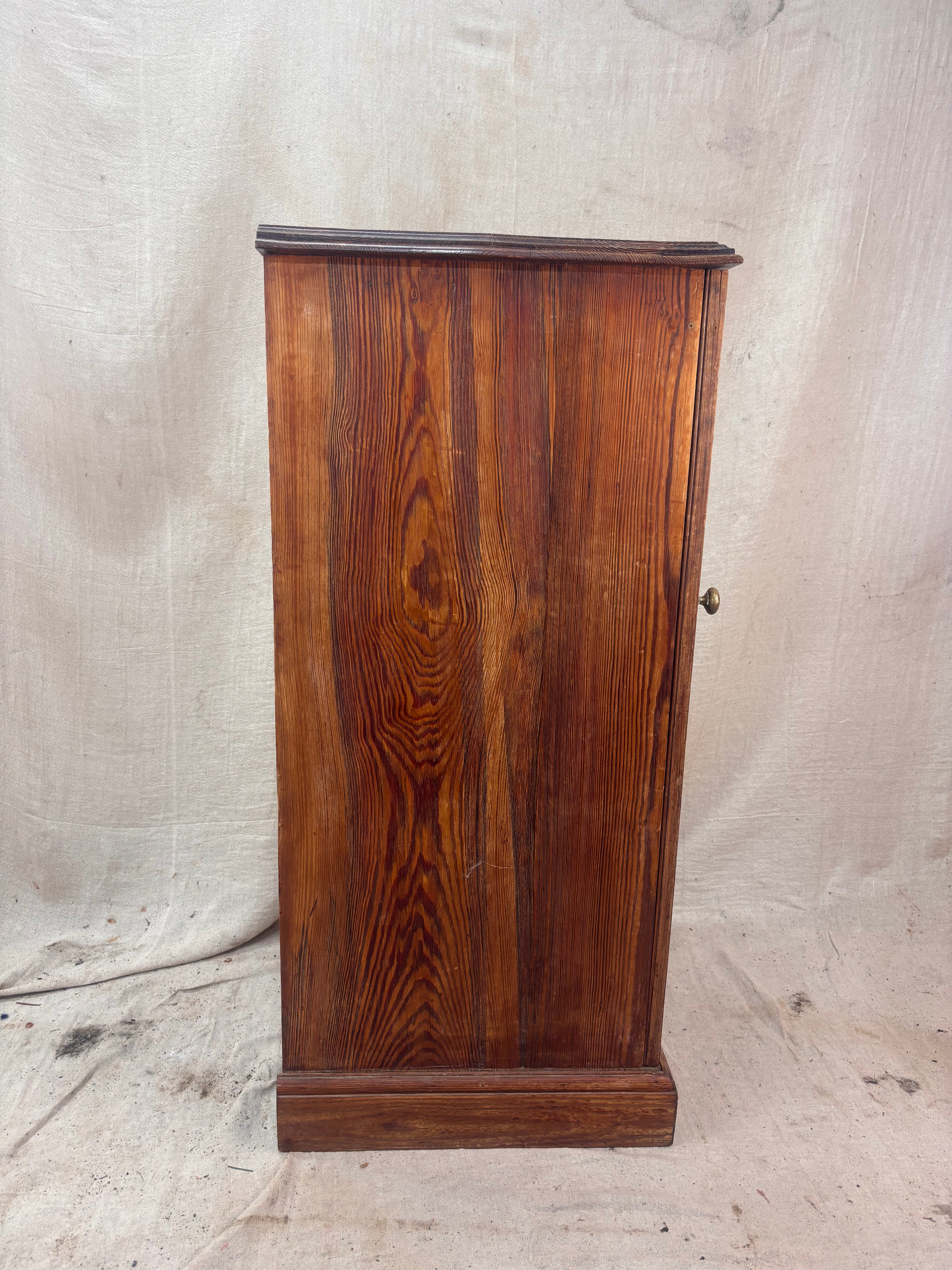 Wooden cabinet with a textured white background